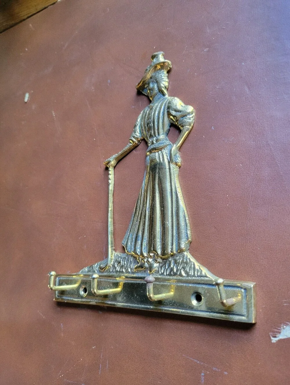 brass key rack holder golf Victorian woman female golfer
